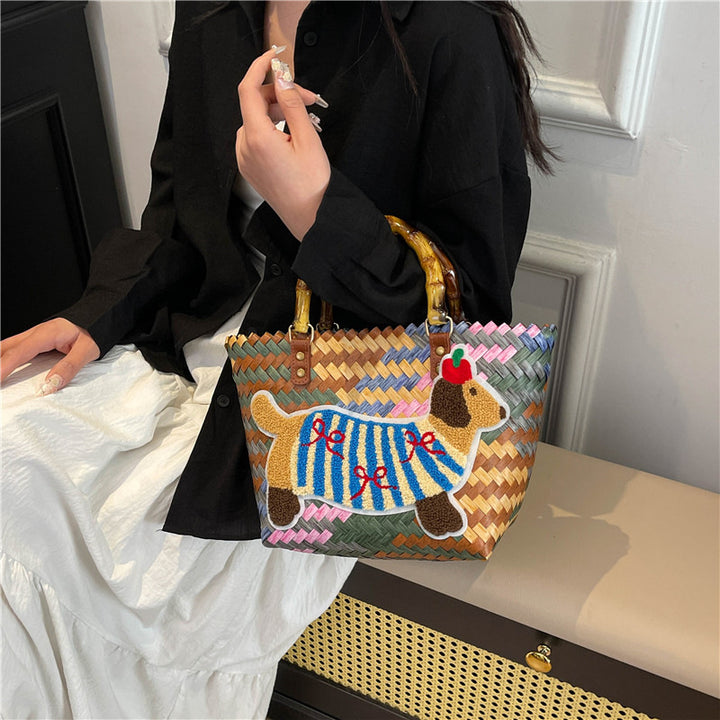 Shoulder bag with playful dog motif Kalsten