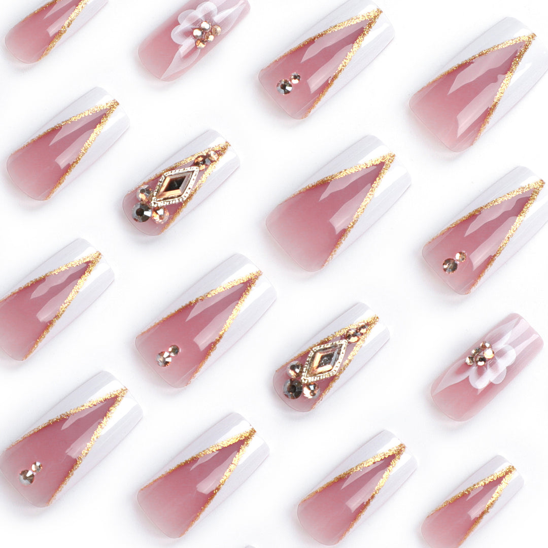 Artistic nail extensions with floral and glitter accents Kalsten