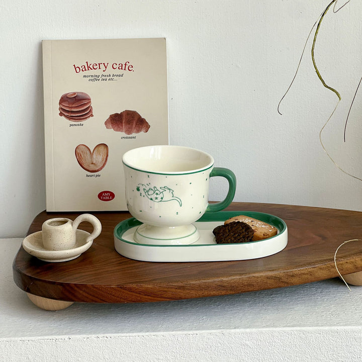 Handcrafted ceramic plate with illustrative cat design