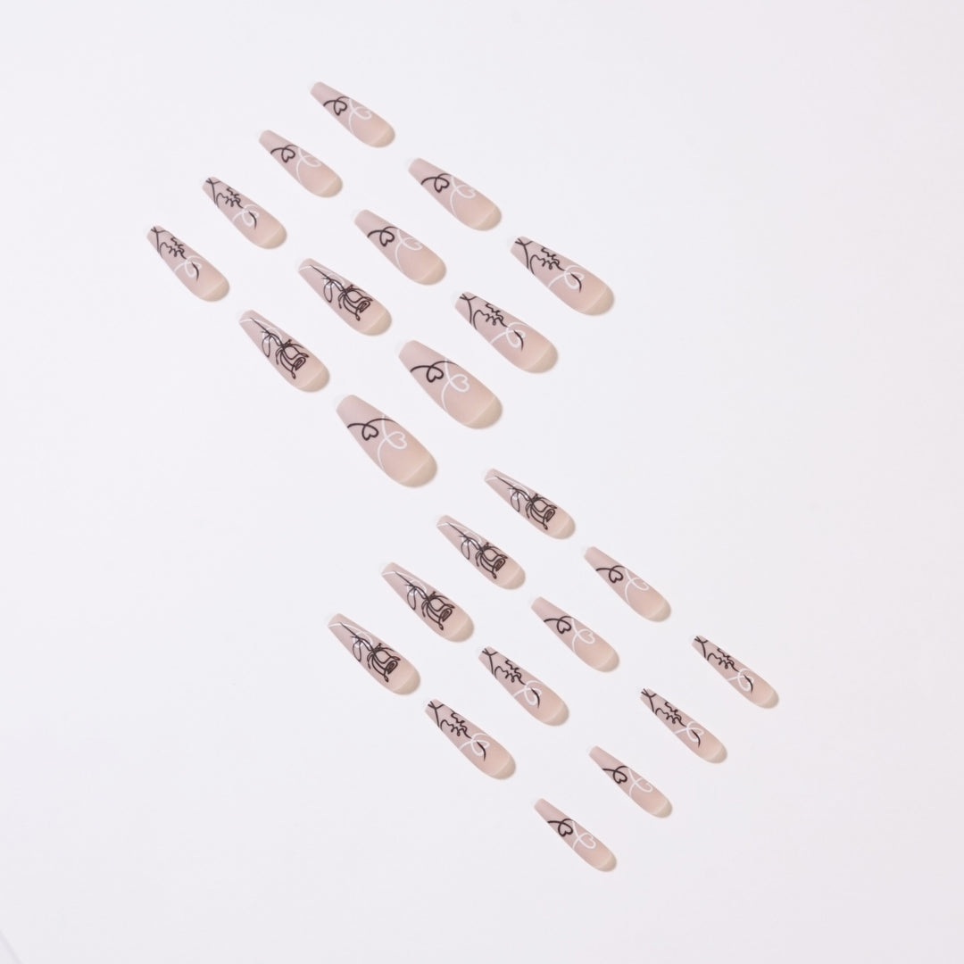 Artful nail extensions with creative line and heart design Kalsten