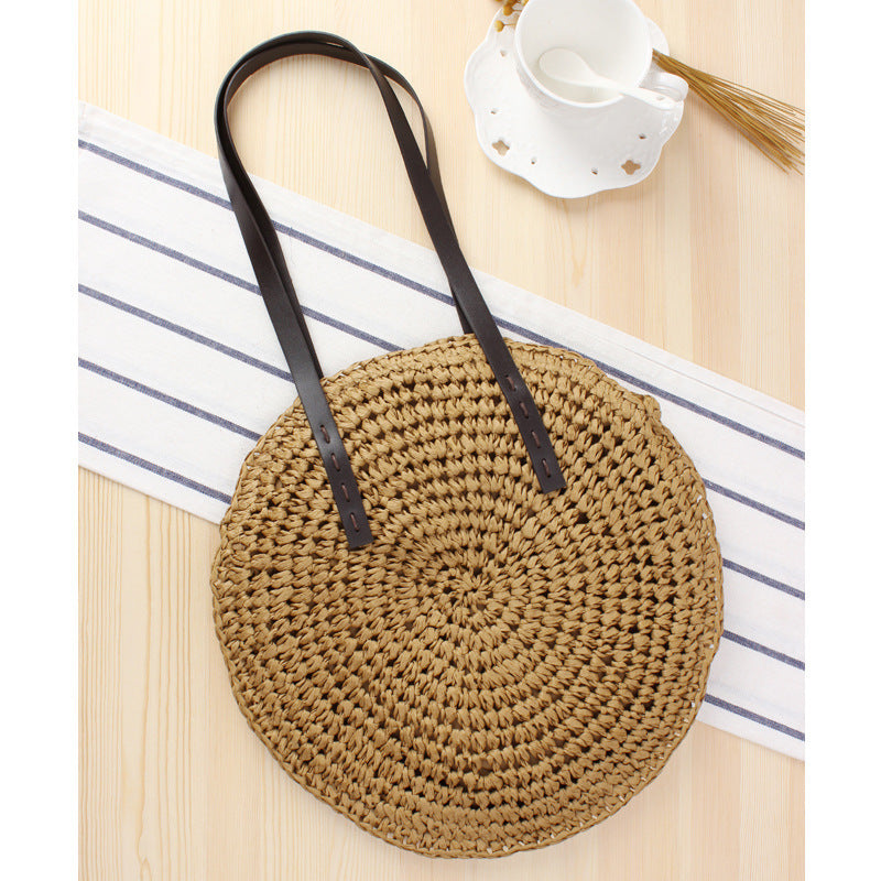 Round basket bag with sturdy leather handles Kalsten