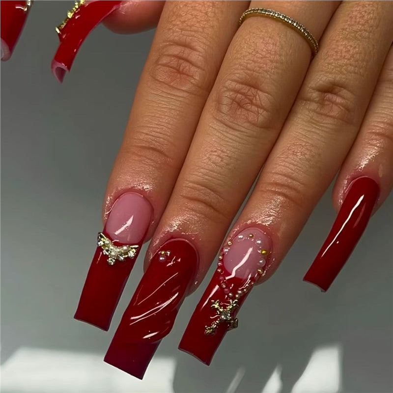 Elegant Press-On Nail Art with Gold Embellishments Kalsten
