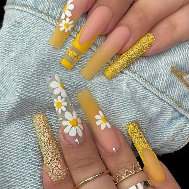 Artificial nail set with colorful sunflower designs and glittering accents Kalsten