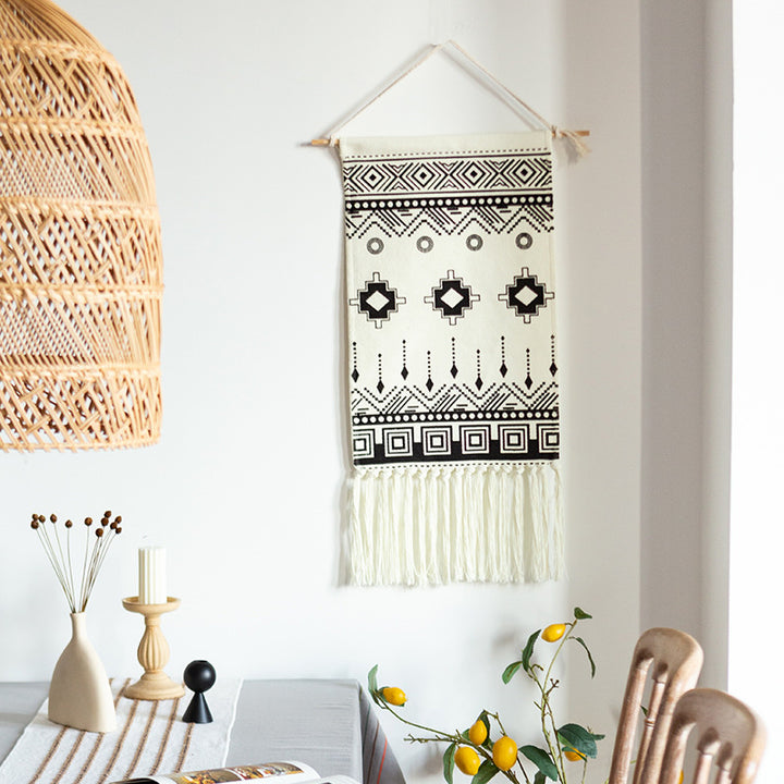 Woven cotton blend wall hanging with graphic ethnic pattern and long fringes Kalsten