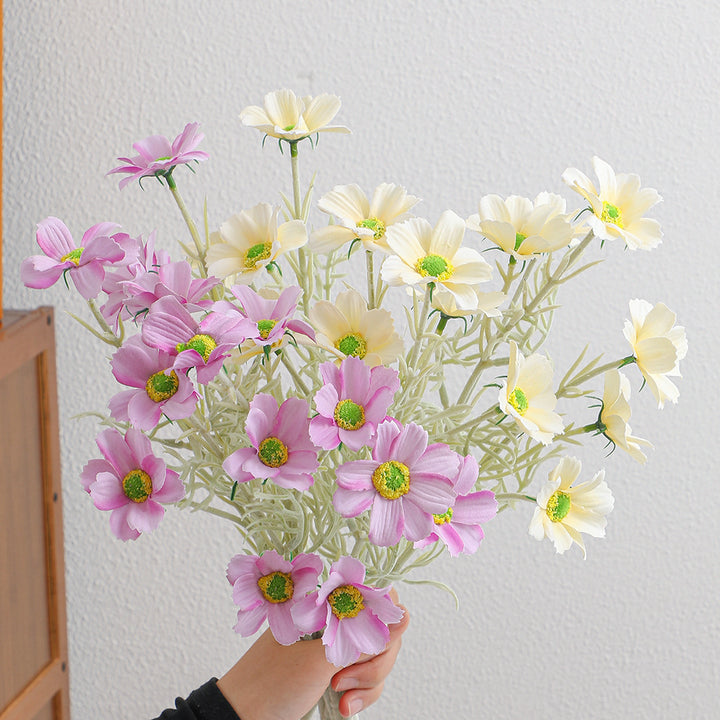 Elegant artificial flower bouquet with intricately detailed blooms