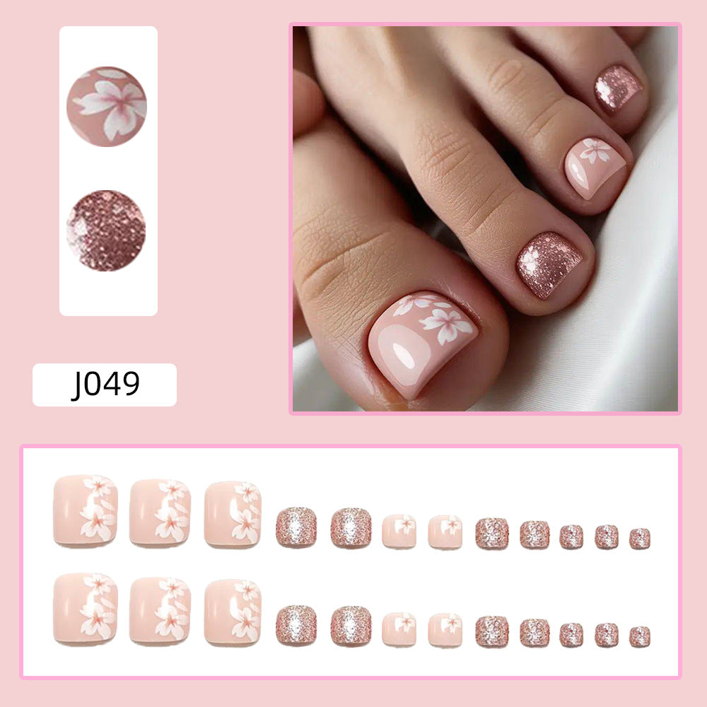 Fingernail art set with elegant floral design and glitter accents Kalsten