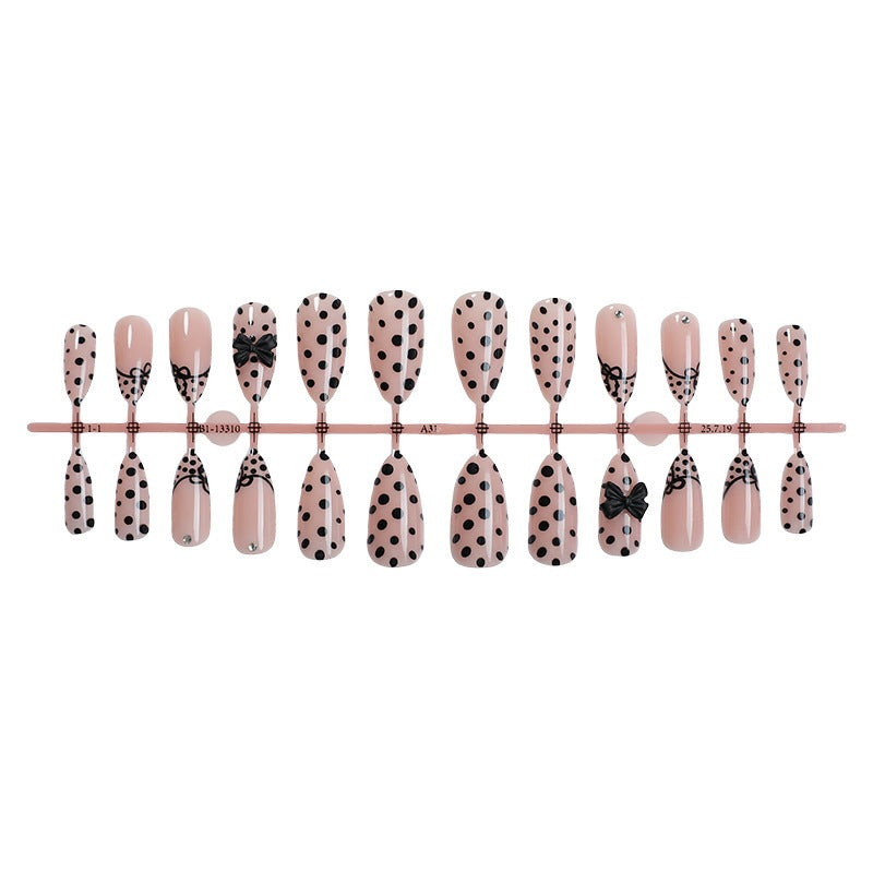 Nail art set with elegant polka dot and bow motifs Kalsten