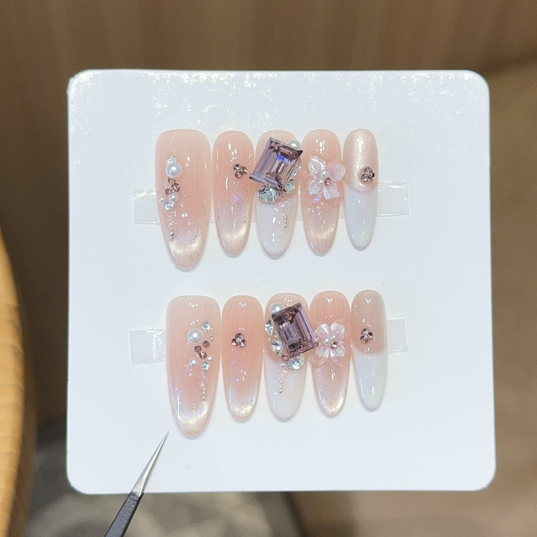 Artificial nails with elegant jewelry details Kalsten