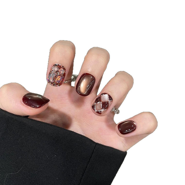 Artificial nails with creative rhinestone design Kalsten