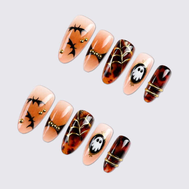 Halloween Artificial Nail Set with spooky designs and golden accents Kalsten