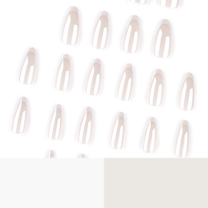 Artistic stiletto nails with elegant French tip embellishments Kalsten