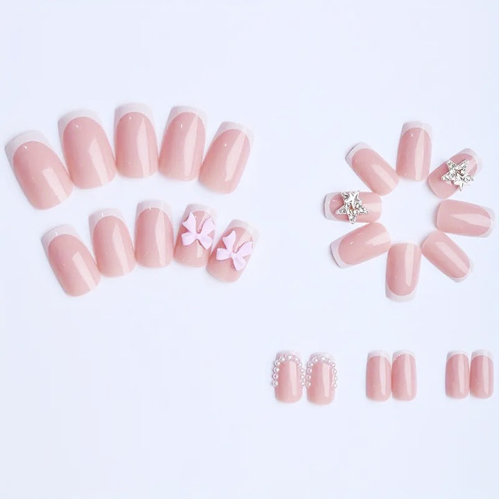 Artificial nail tips with glamorous bow and rhinestone design Kalsten
