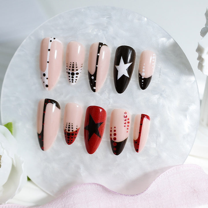 Artificial nail set with eye-catching star and dot designs Kalsten
