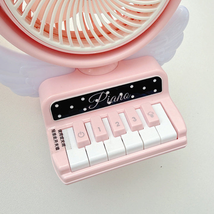 Portable table fan in playful piano design Kalsten