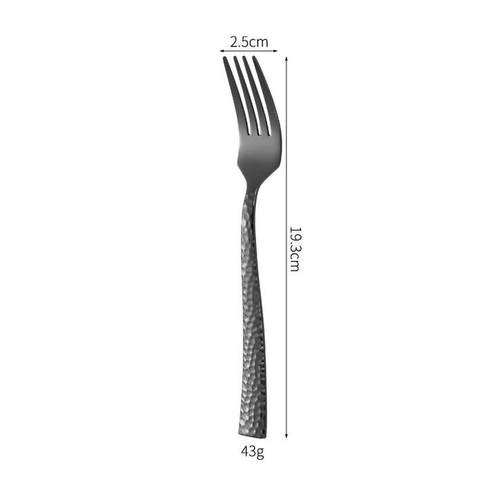 Elegant spoon with unique surface design Kalsten