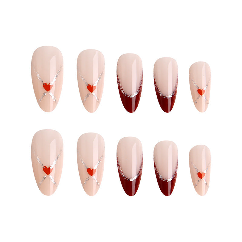 Acrylic nails with heart motifs and glitter details Kalsten