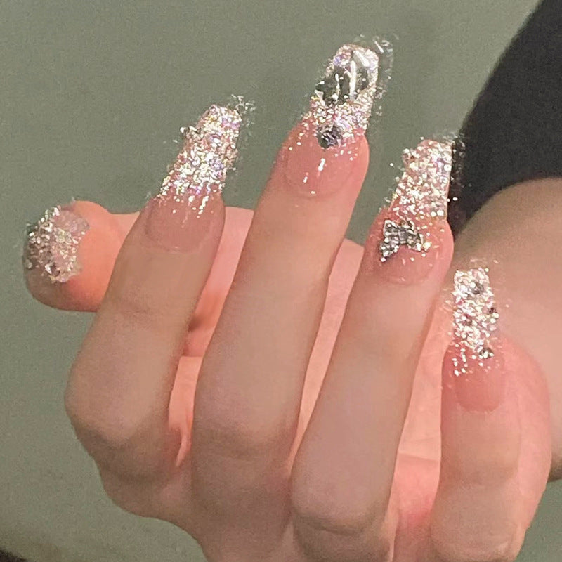 Glamorous artificial nails with sparkling rhinestones and elegant designs Kalsten