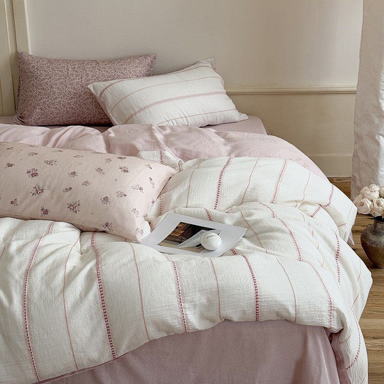 Breathable linen-cotton bedding set with quilted stripes and reversible design