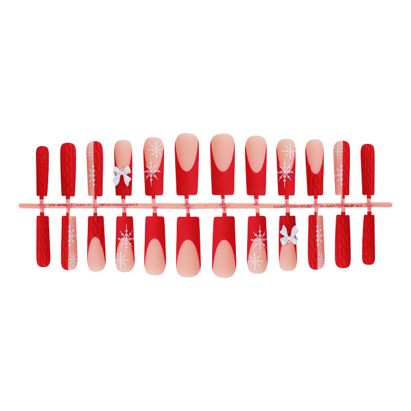 Artificial nail set with festive snowflake and bow motifs Kalsten
