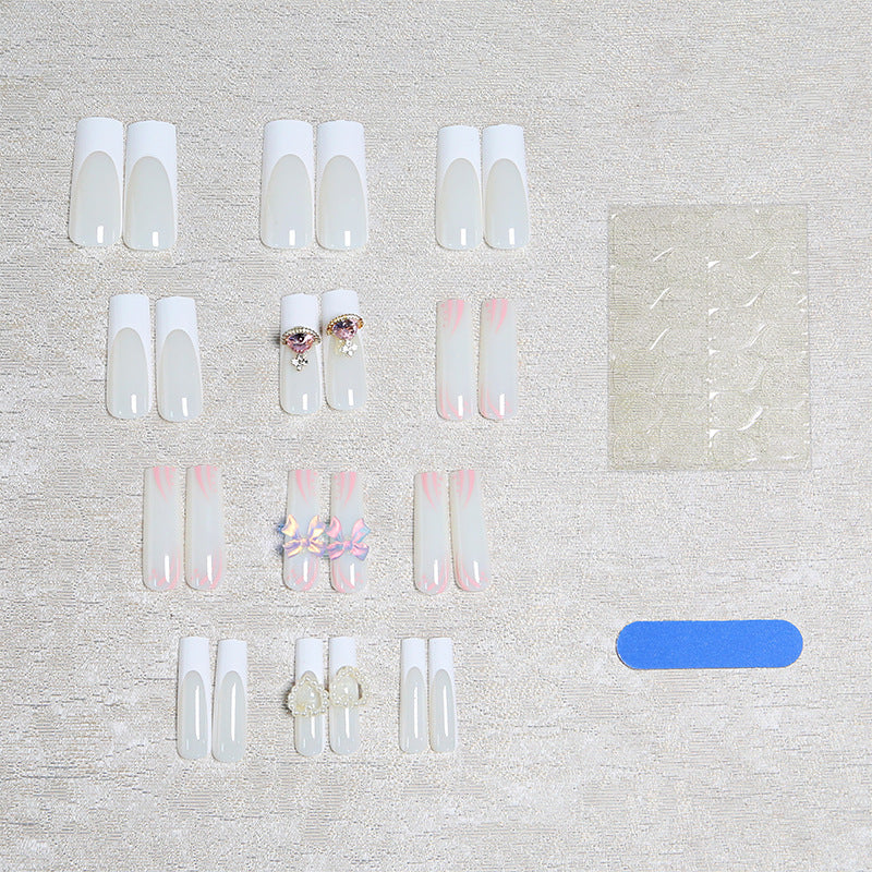 Artificial nails with delicate embellishments Kalsten