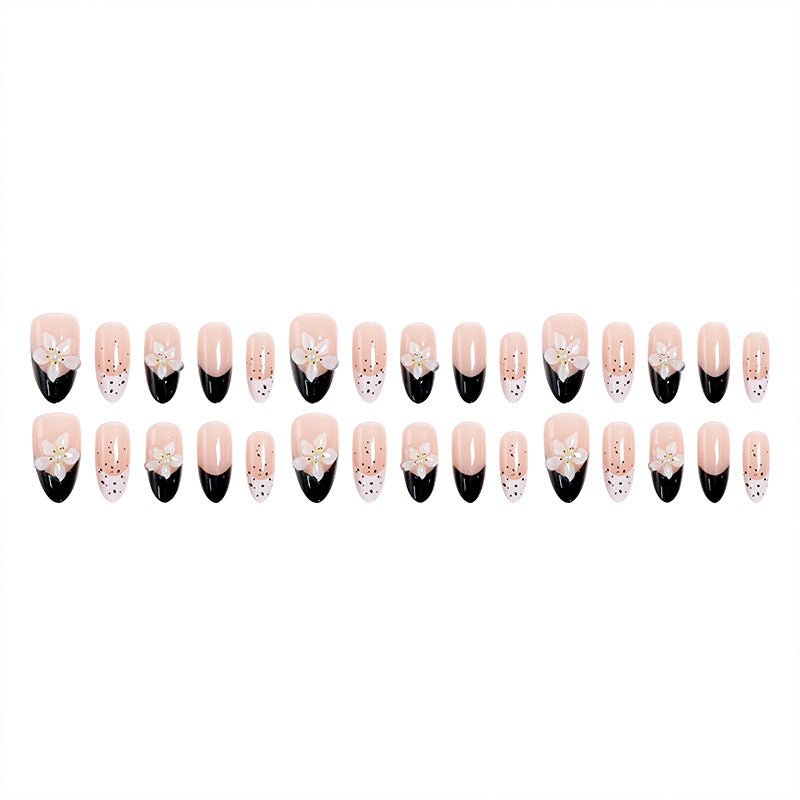 Artful nail tips with floral embellishments Kalsten