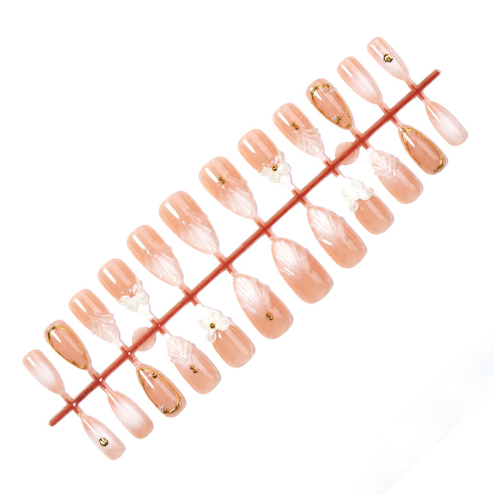 Acrylic nail set with elegant 3D designs and golden accents Kalsten