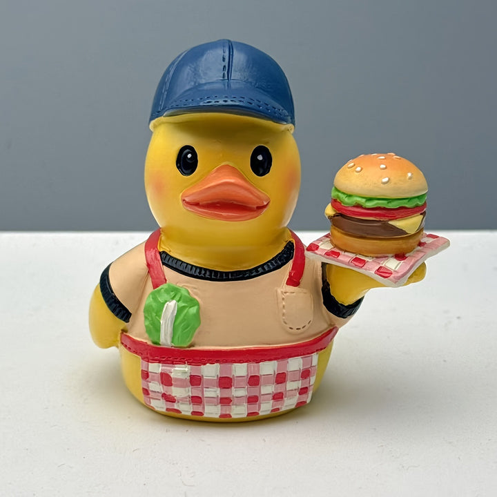 Funny rubber duck as grill master Kalsten