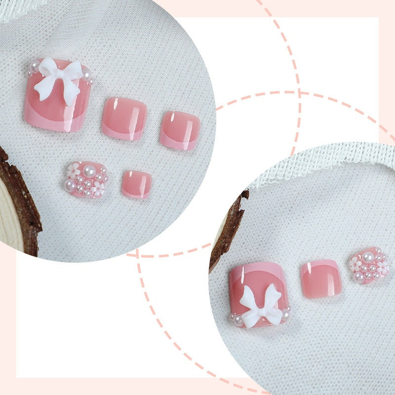 Artificial nail set with romantic bow design Kalsten