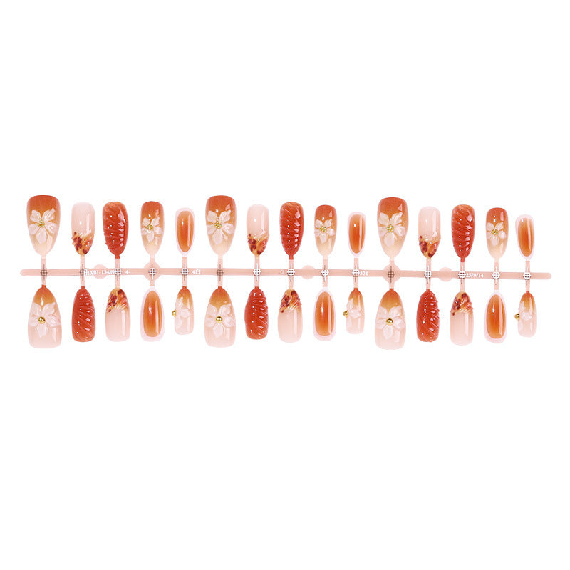 Artificial nail set with floral accents and glamorous design Kalsten