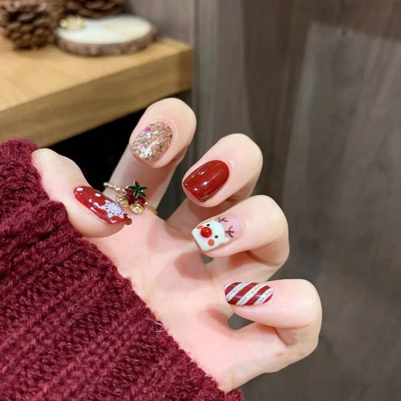 Artificial nail design with festive Christmas motif Kalsten