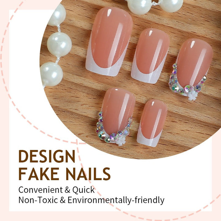 Nail art set with delicate flower and glitter accents Kalsten