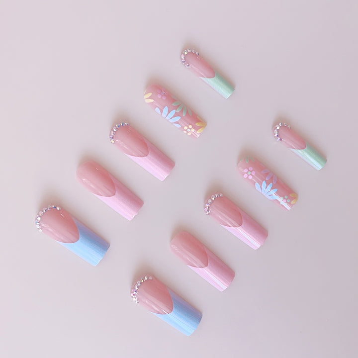 Artificial nail set with floral 3D embellishments and rhinestone accents Kalsten