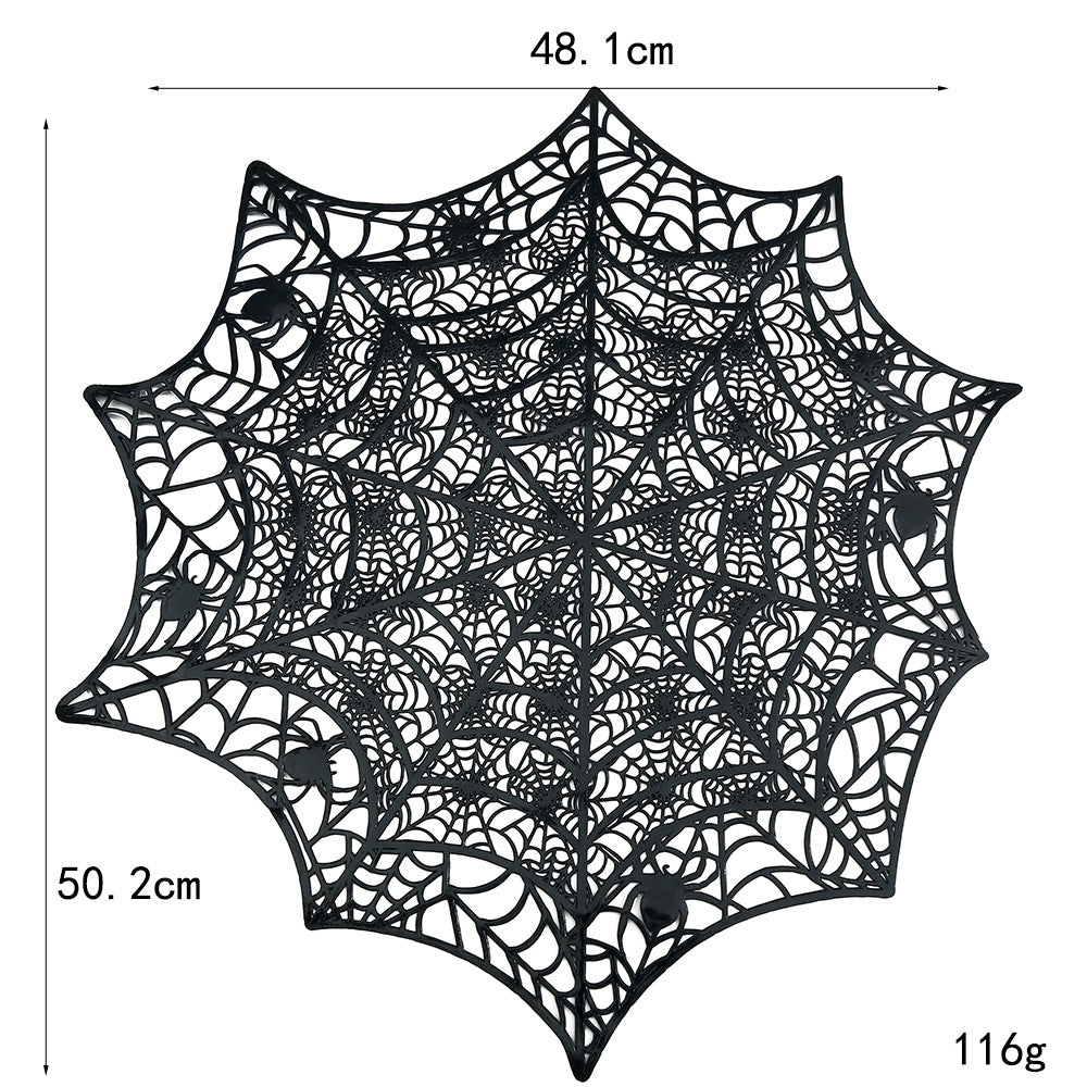 Flexible spiderweb table mat made of heat-resistant silicone as a placemat and decorative coaster with spider relief