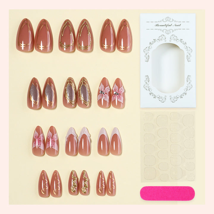 Artificial nail set with elegant blooming designs and golden accents Kalsten
