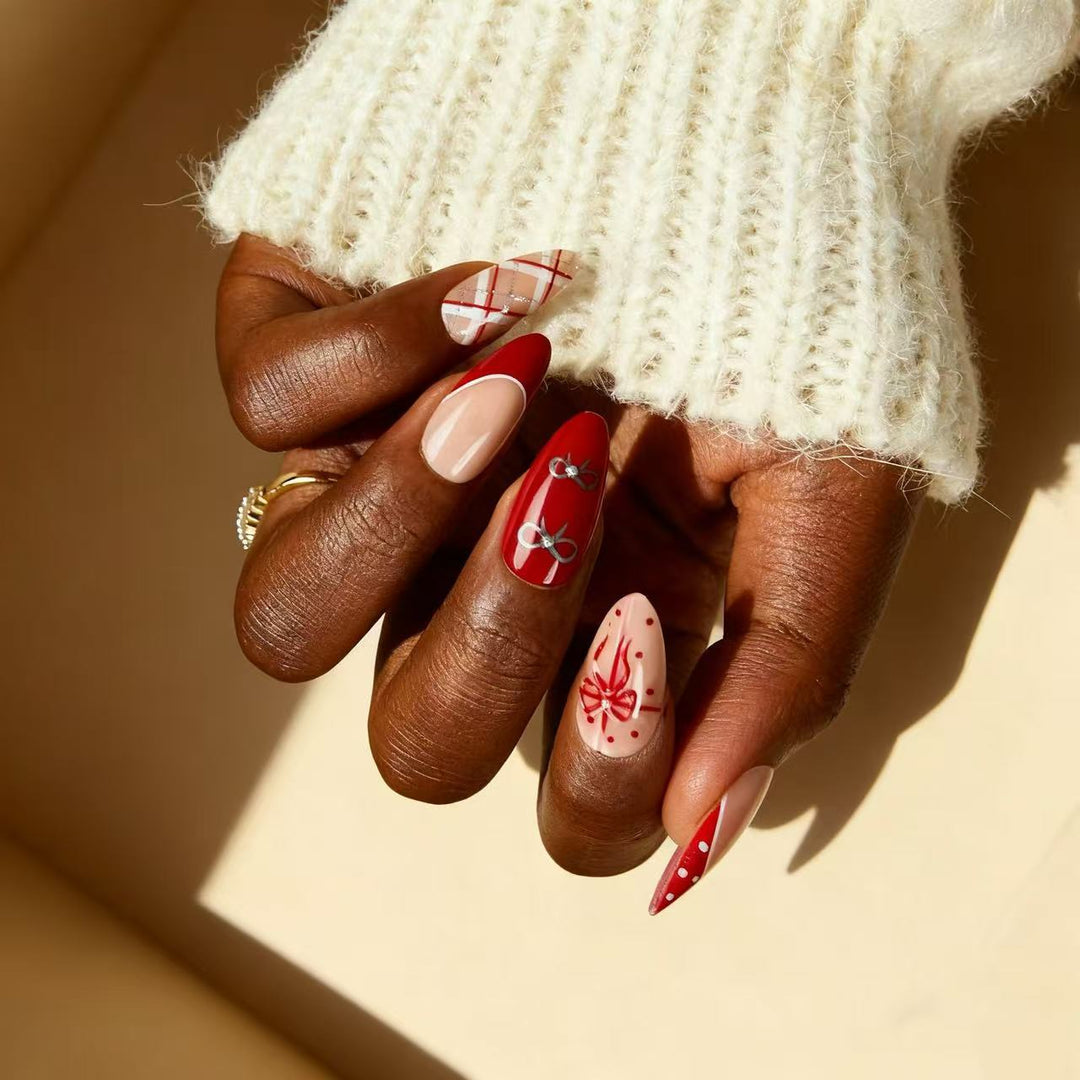 Artful nail extensions with elegant patterns and embellishments Kalsten