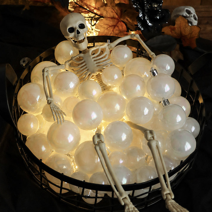 Set of pearl-glossy plastic Christmas ornaments in two sizes