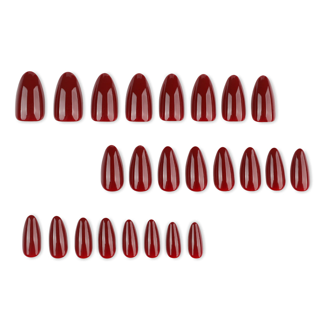 Glamorous stiletto nails with high gloss and elegant design accents Kalsten