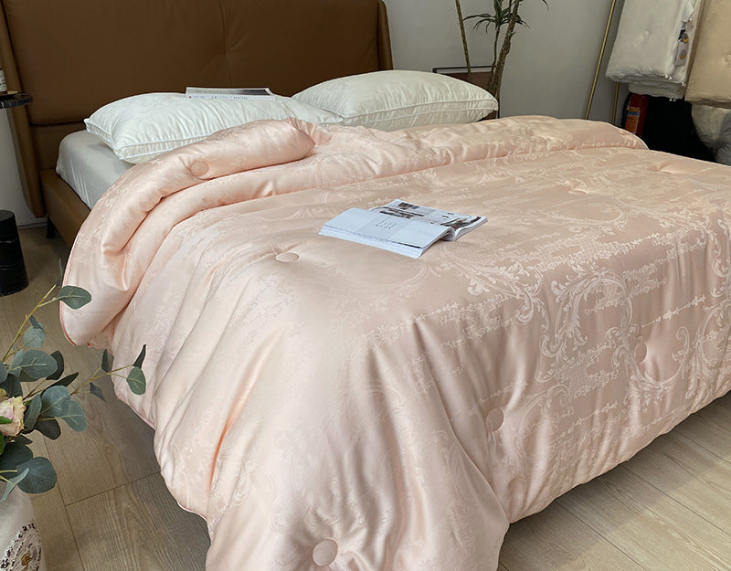 Extra light satin jacquard quilt with subtle button quilting