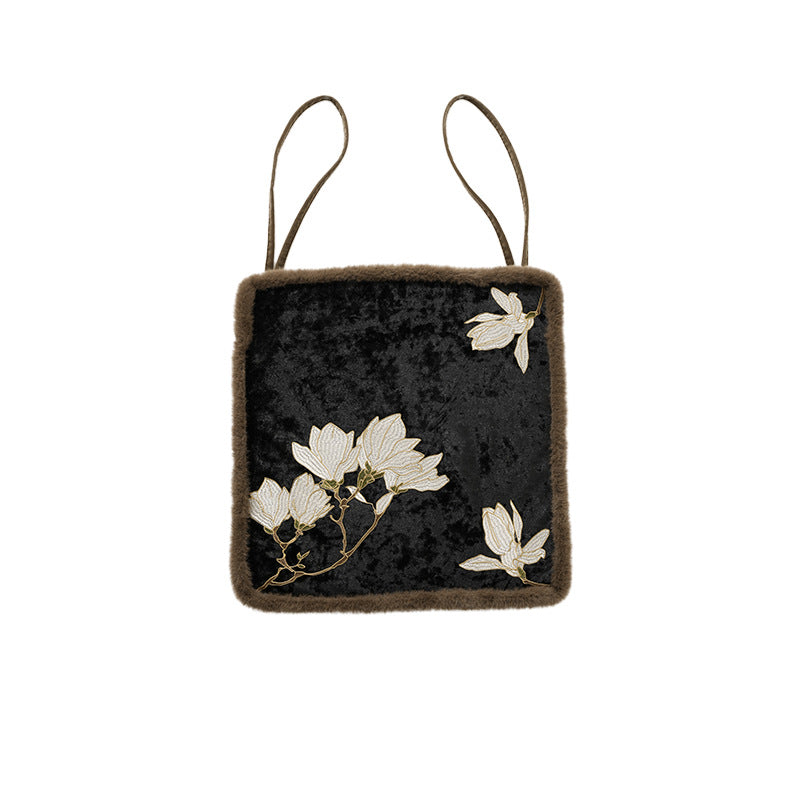 Padded seat cushion with velvet cover, floral embroidery and faux fur trim Kalsten