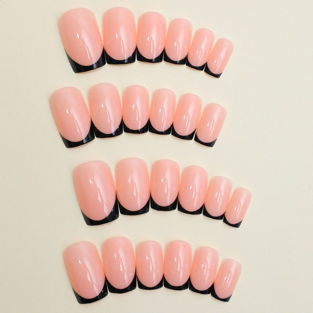Artificial nail set with elegant French tip design and modern accents Kalsten