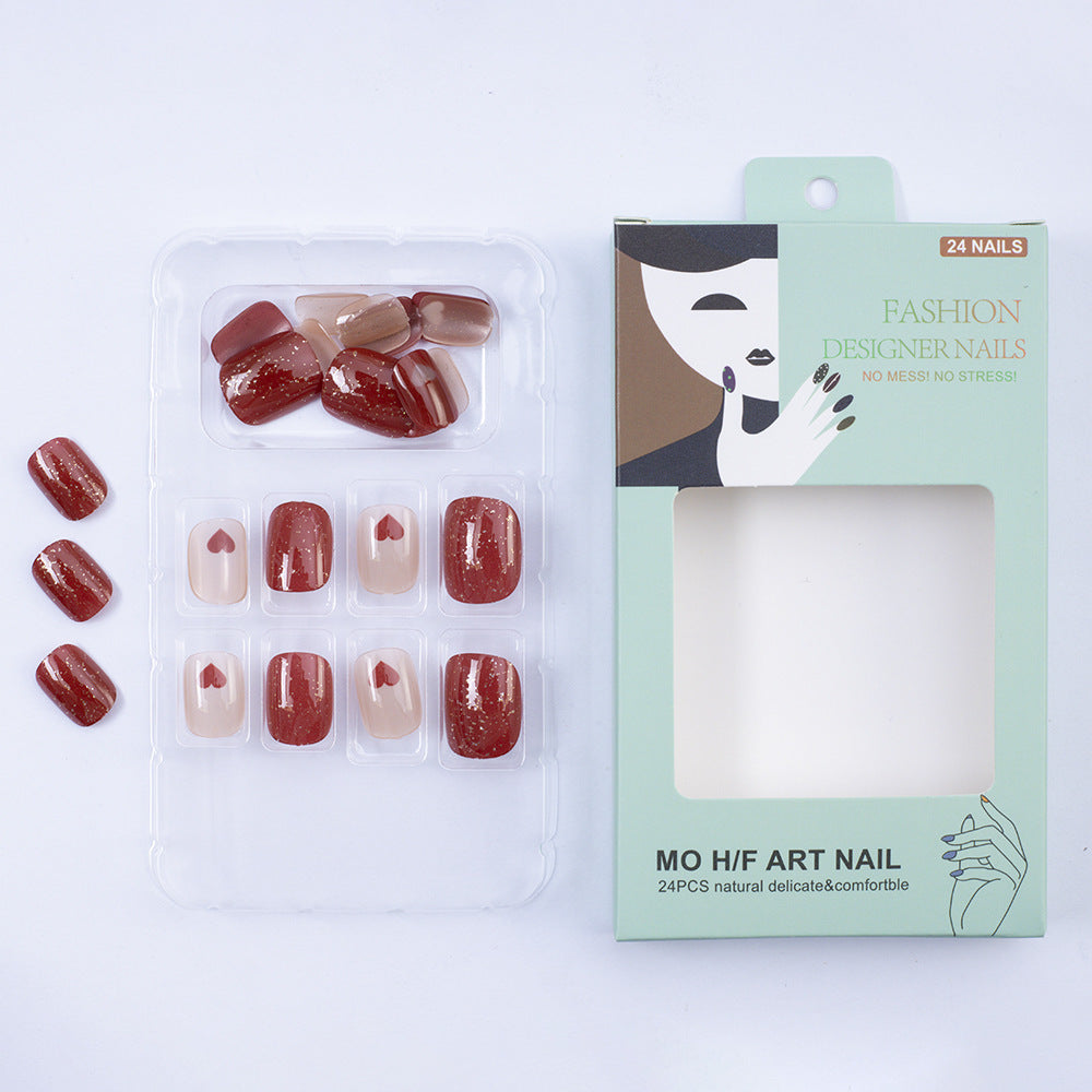 Art nail set with heart designs and glitter Kalsten