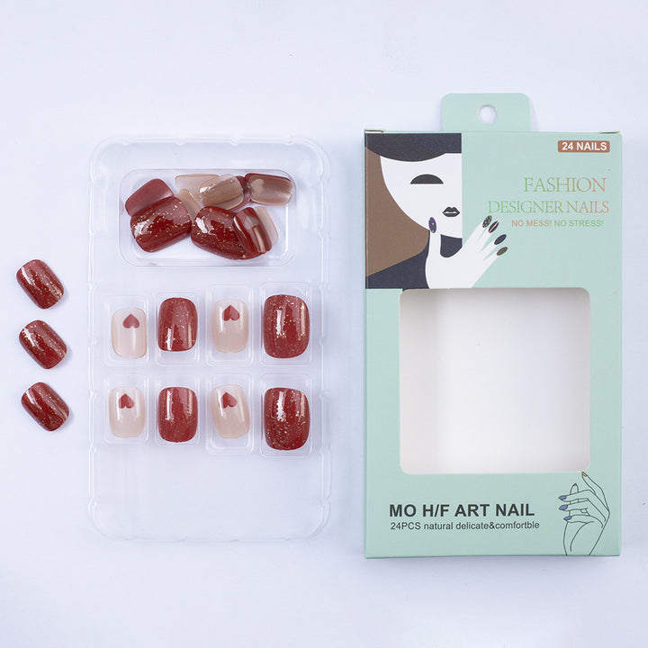 Art nail set with heart designs and glitter Kalsten