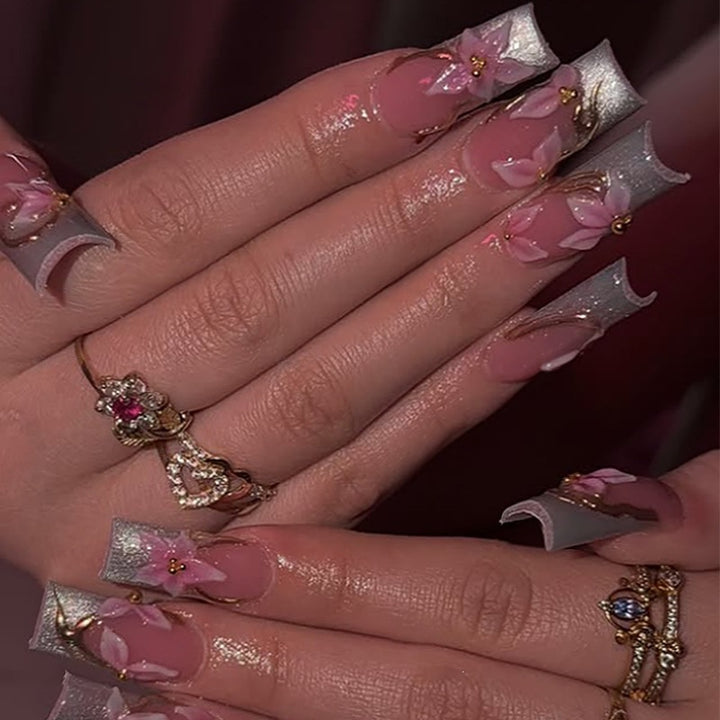 Elegant artificial nail set with floral designs and glitter accents Kalsten