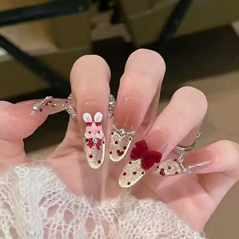 Artistic Stiletto Press-On Nail Art with Glimmering Accents Kalsten