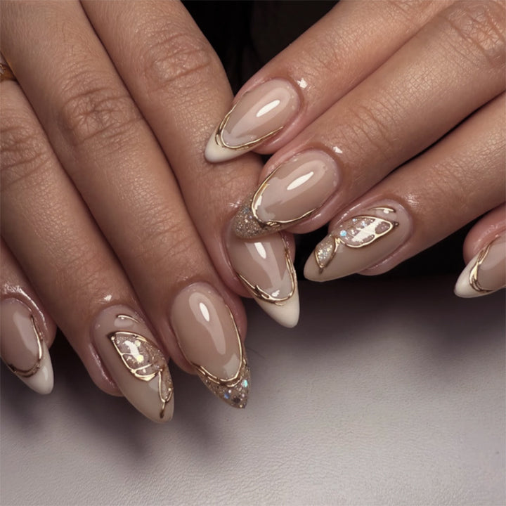 Elegant Stiletto Nails with Glitter and Spike Decorations Kalsten