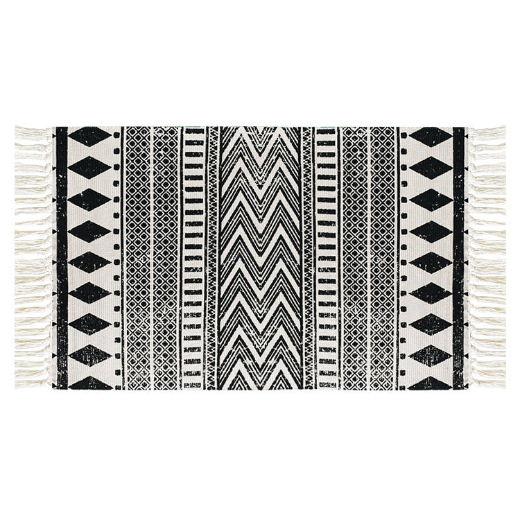Flat-woven cotton runner with Mediterranean tile jacquard and decorative fringes Kalsten