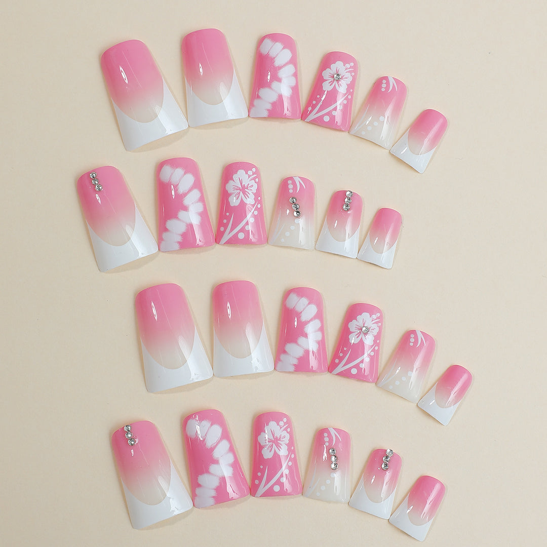 Acrylic nail set with elegant floral designs and glitter accents Kalsten