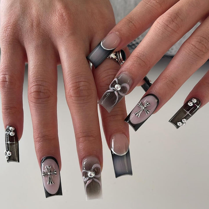 Artful acrylic nails with unique jewelry embellishments Kalsten