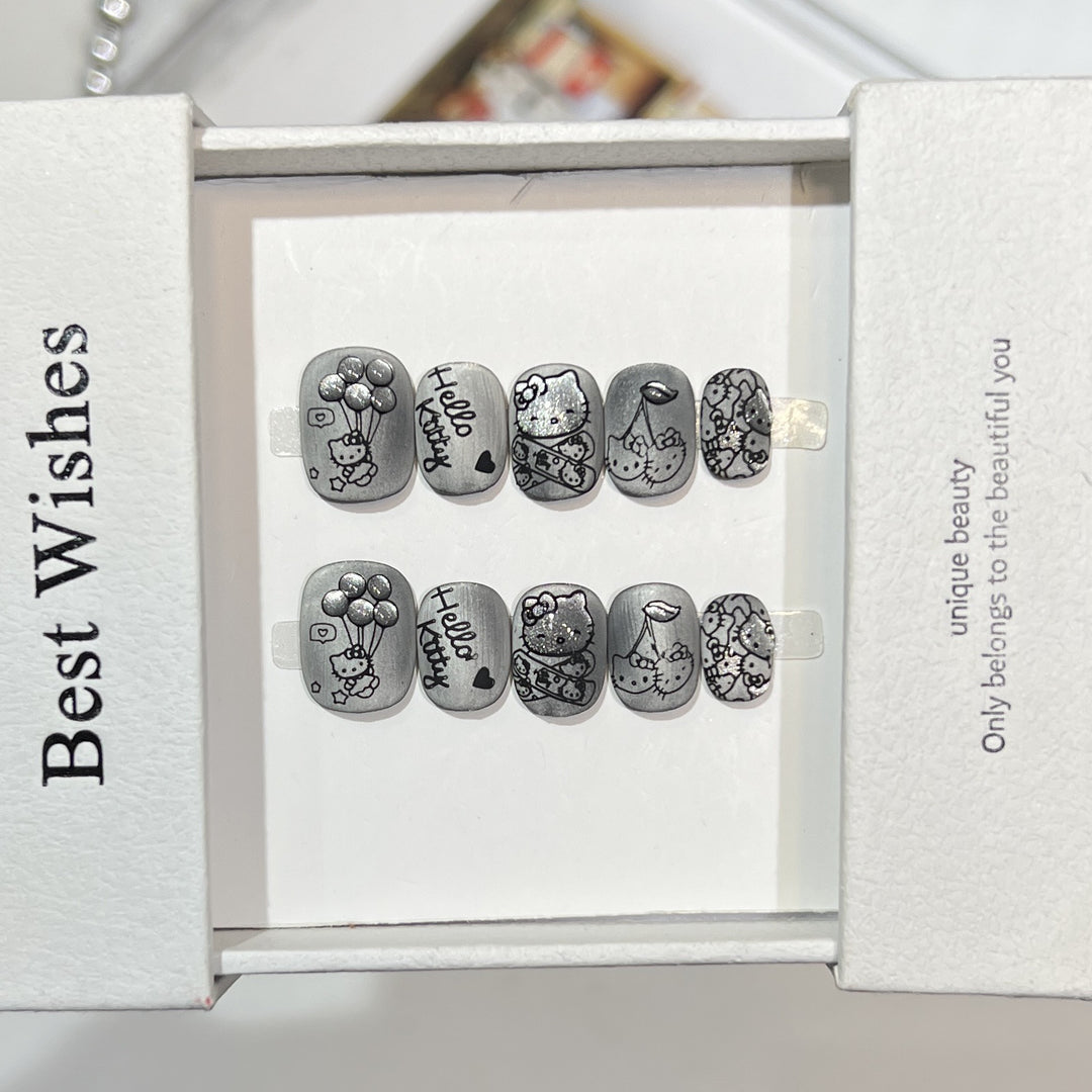 Artistic Press-On Nail Set with Whimsical Character Designs Kalsten