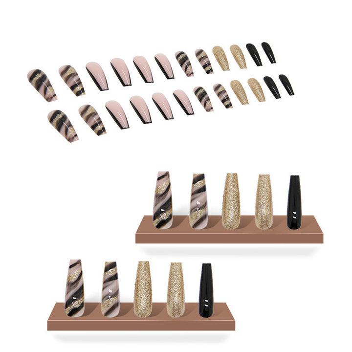 Acrylic nail set with luxurious golden accents and elegant designs Kalsten